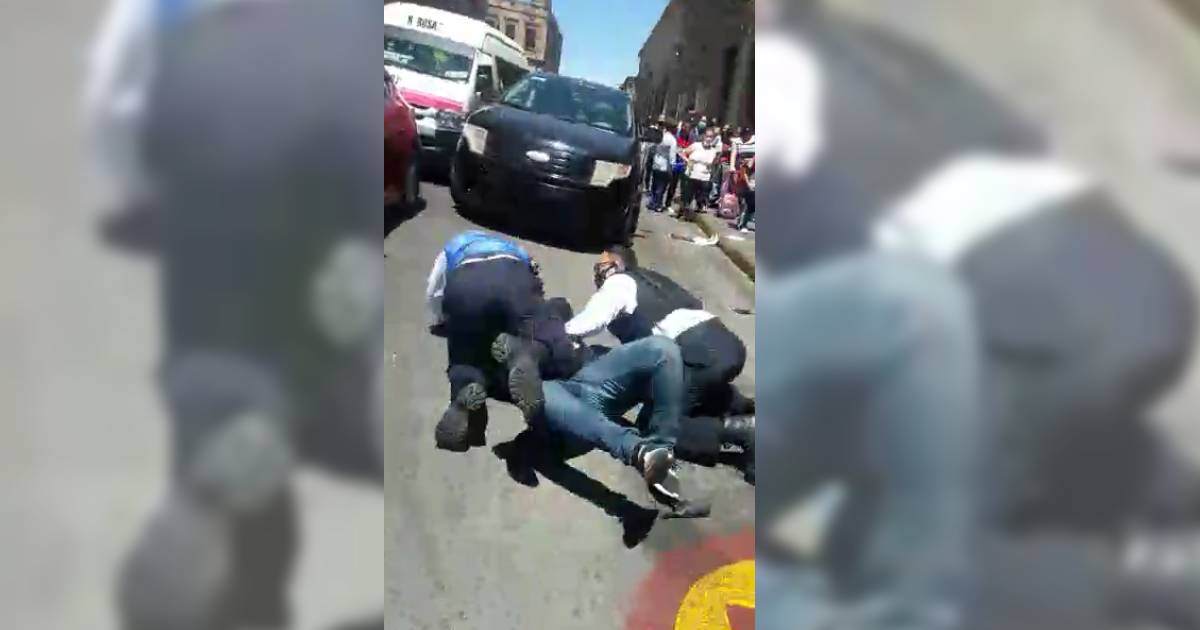 Policías de Morelia someten a un automovilista violentamente frente a niños